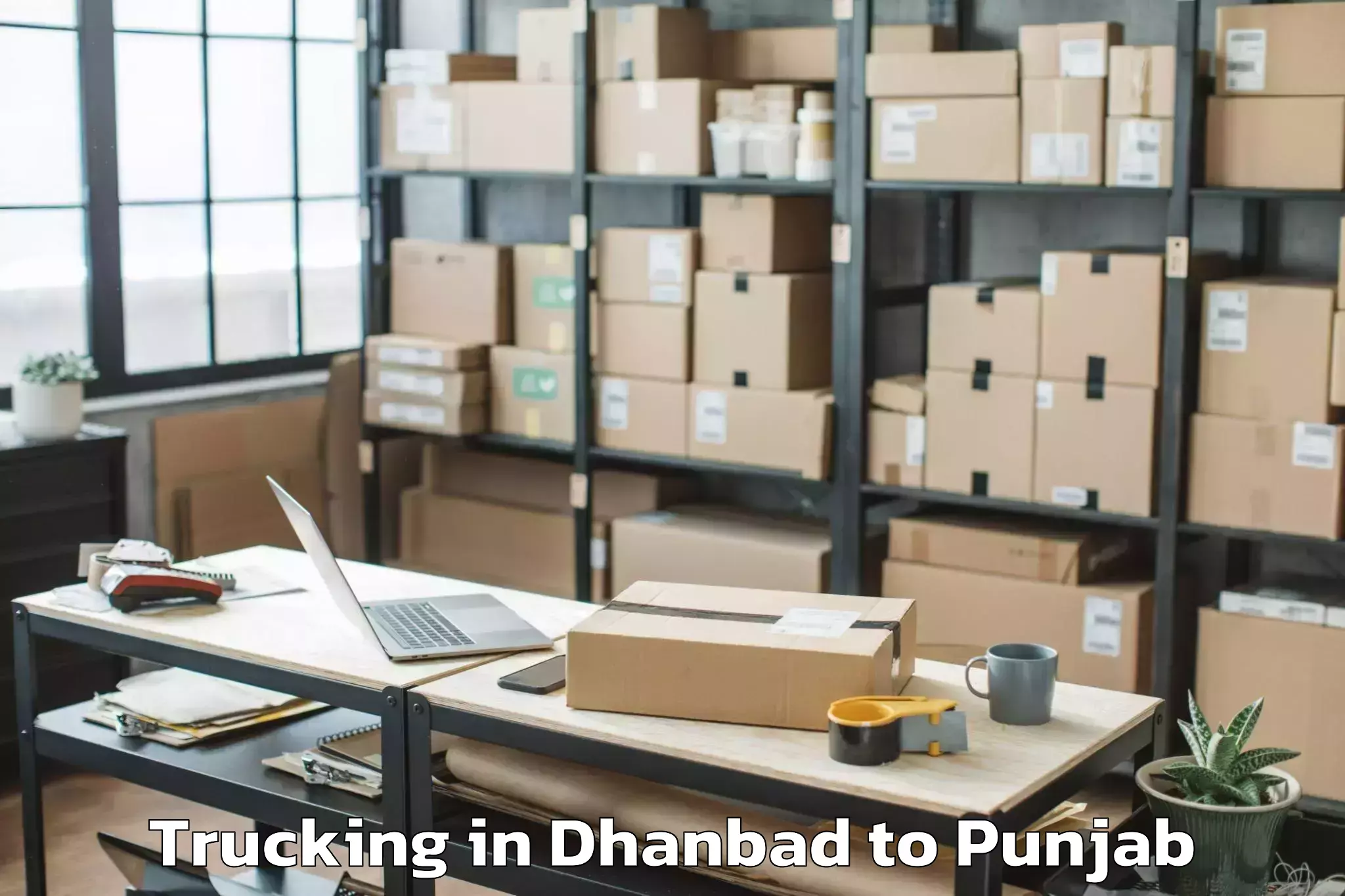 Book Dhanbad to Kotli Trucking Online